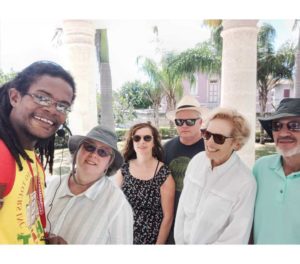 Thumbnail image of tour guide Kristin and guests gathered at the Codd Monument in Bridgetown, celebrating the end of an enlightening historical tour.