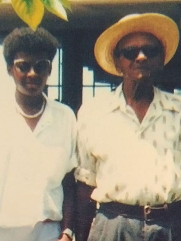 Deborah, founder of Chattel House Audio Tours, with her late father, architects of her love for Barbados' heritage.