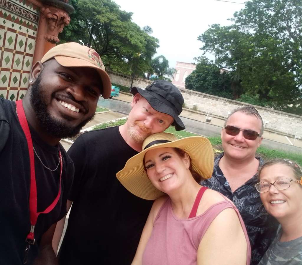 Guide Evan with guests, concluding the Bridgetown city tour by Chattel House Audio Tours, sharing a memorable finale.