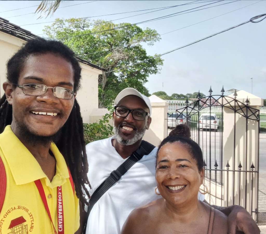 Kristin, a guide with Chattel House Audio Tours, shares a moment with a couple at the conclusion of the Garrison & George Washington House tour.